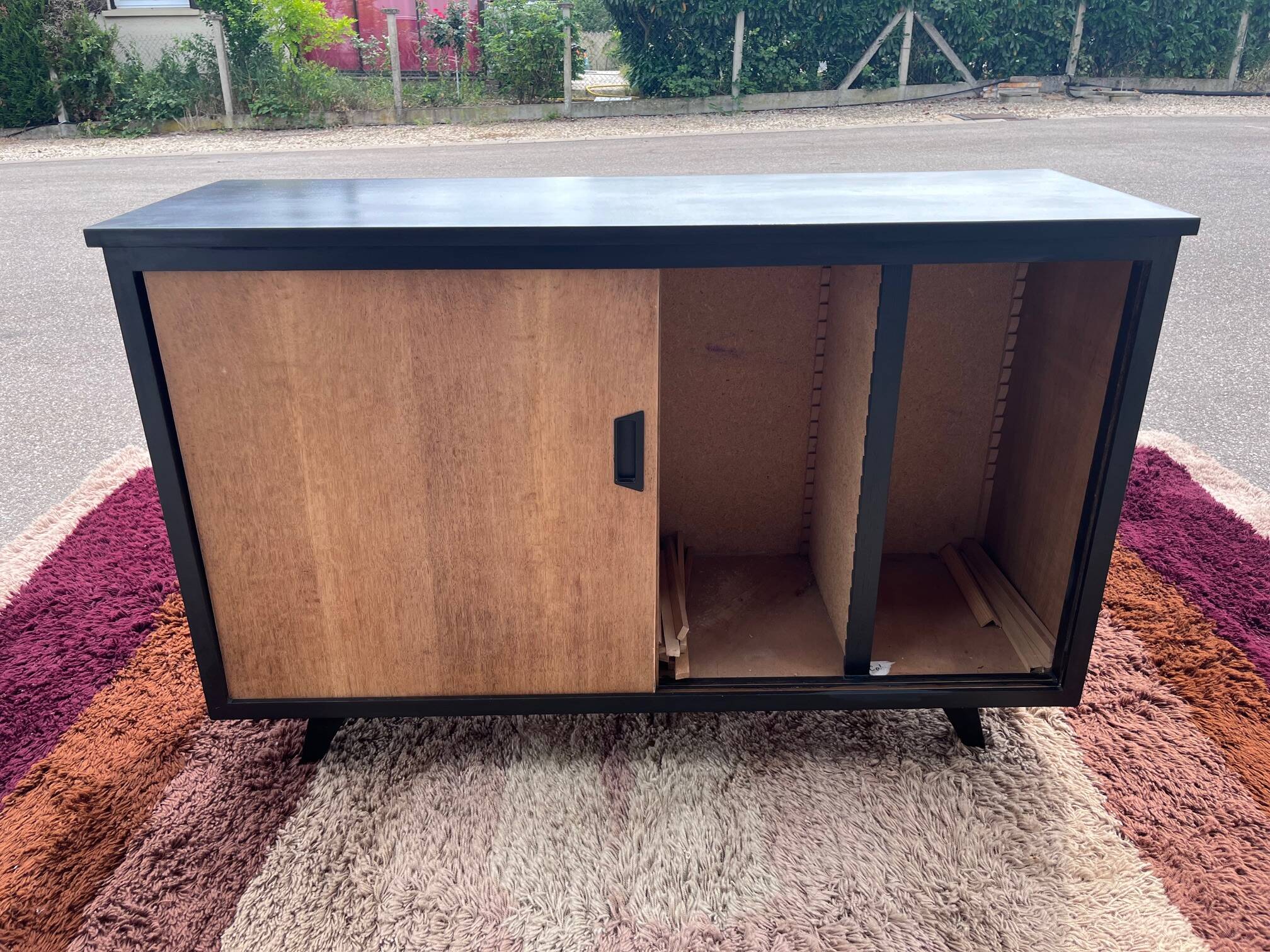 black and wood two-door sideboard