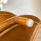 Rattan corner shelf