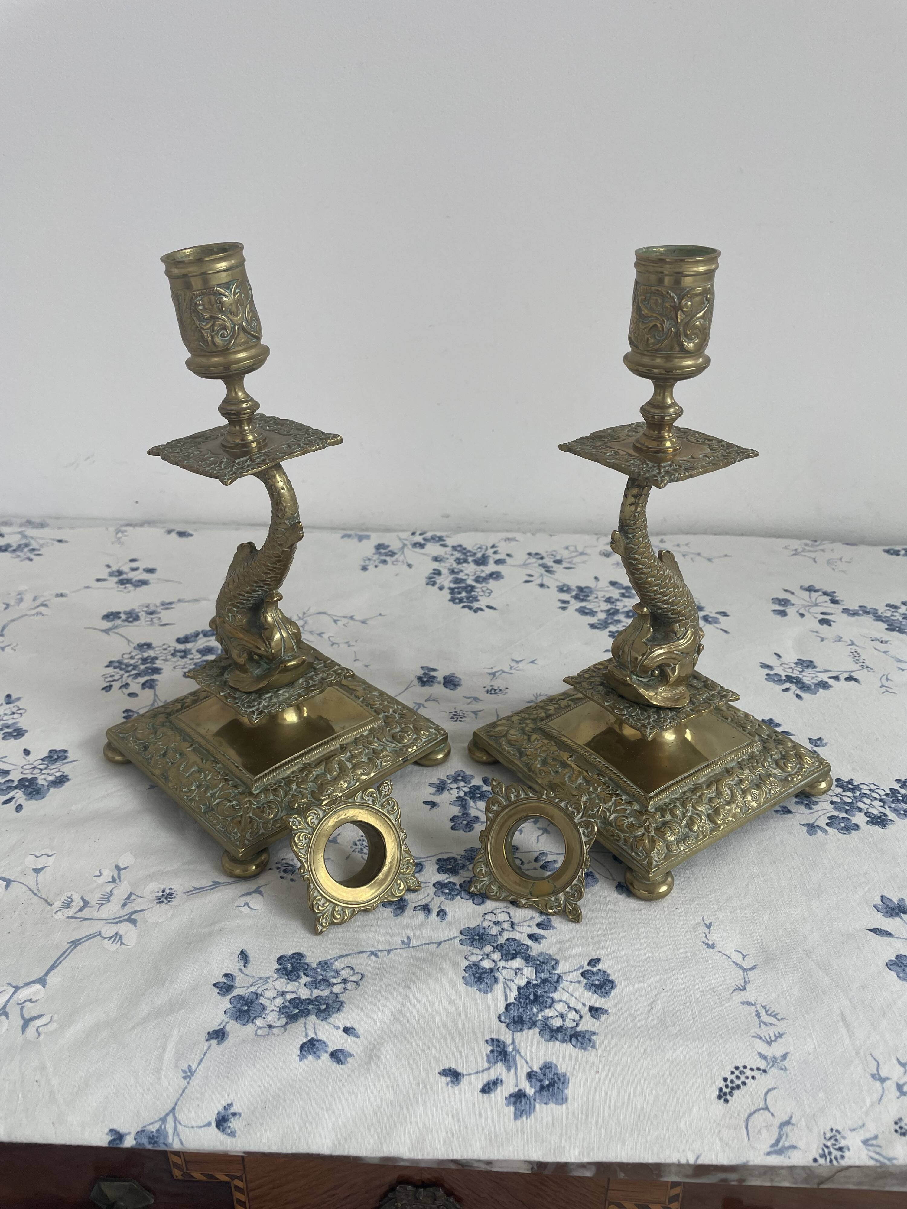 Pair of brass dolphin candlesticks, late 19th century, Napoleonic period