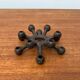 Brutalist Danish candle holder from the mid-century in cast iron by Jens H. Quistgaard.