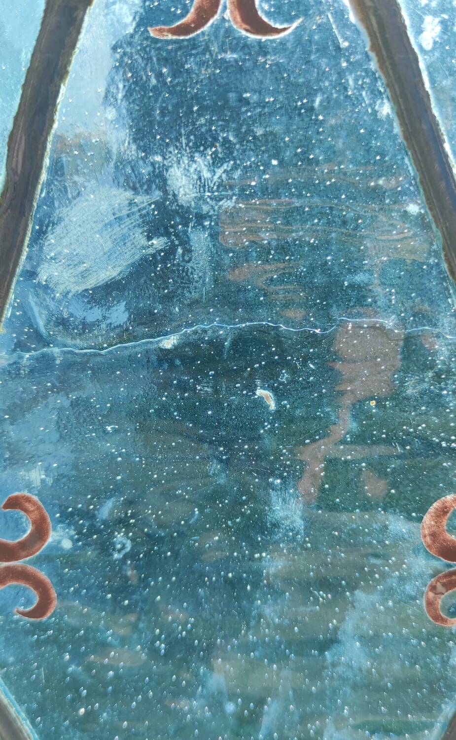 Old stained glass window in the Middle Ages style