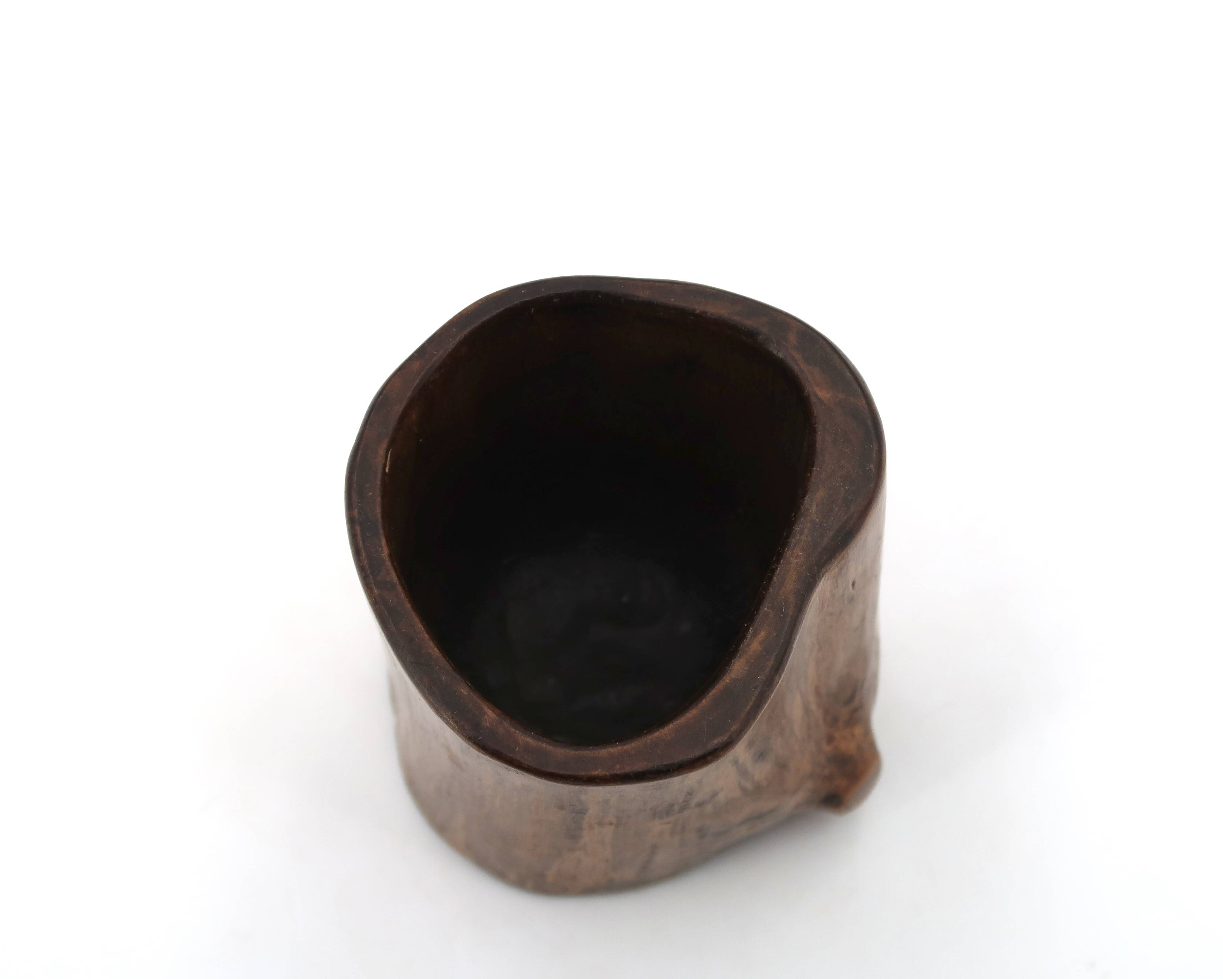 Small brutalist monoxyle vase in wood, 1970s.