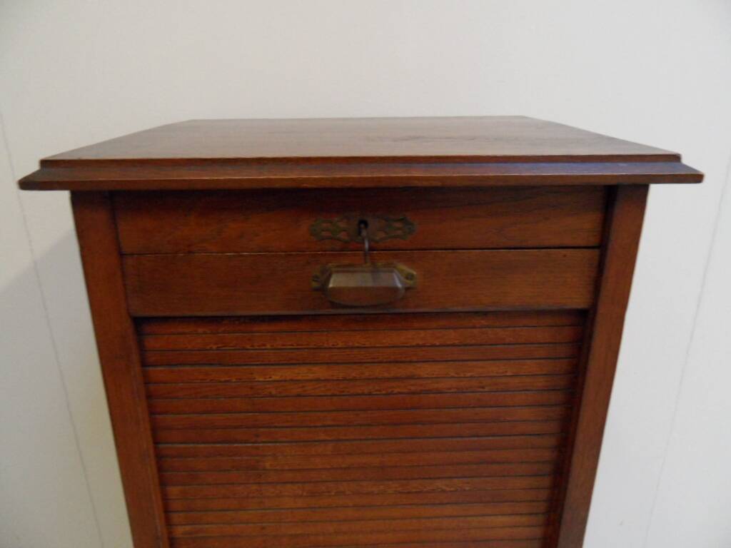 Antique filing cabinet with roller shutter