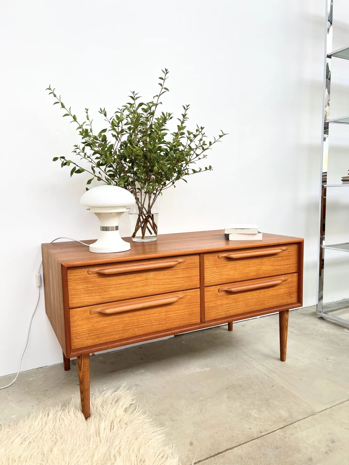 Lowboard teak 4 drawers — Mid-century lines, tapered legs, 1960s