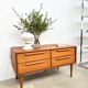 Lowboard teak 4 drawers — Mid-century lines, tapered legs, 1960s
