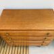 Oak art deco chest of drawers, compass legs