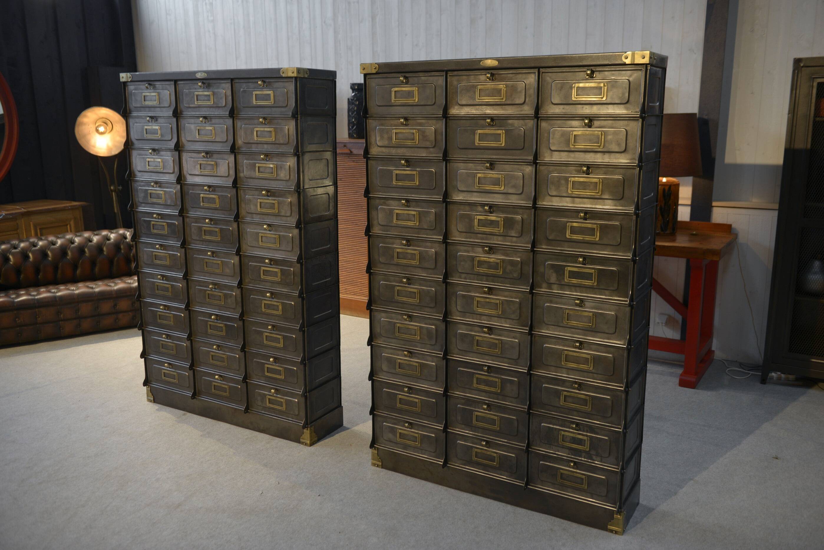 Pair of STRAFOR French cabinets with flaps, circa 1920s
