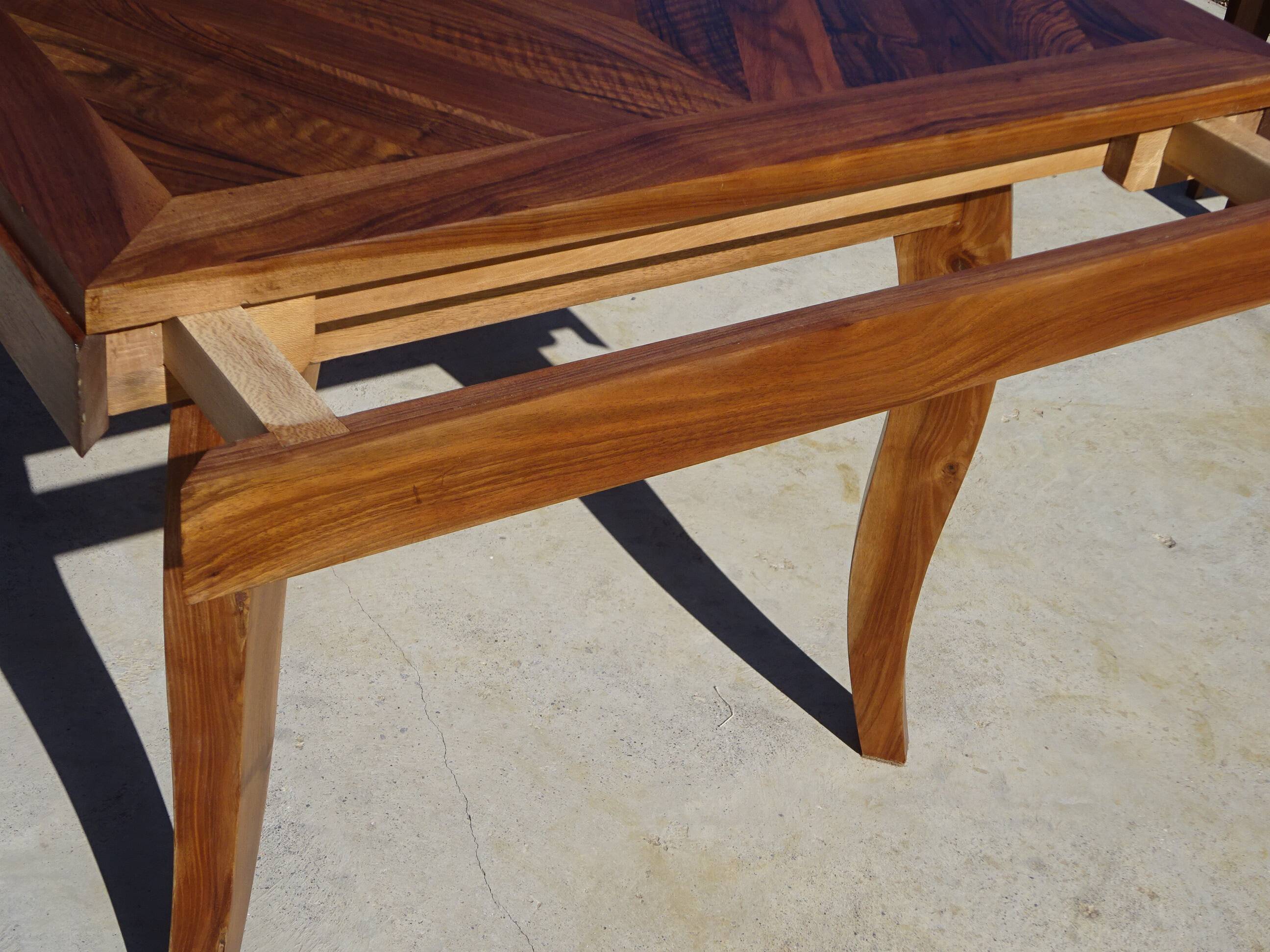 Antique solid walnut table with marquetry and extensions.