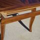 Antique solid walnut table with marquetry and extensions.