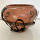 Decorative pot holder in wrought iron and wood