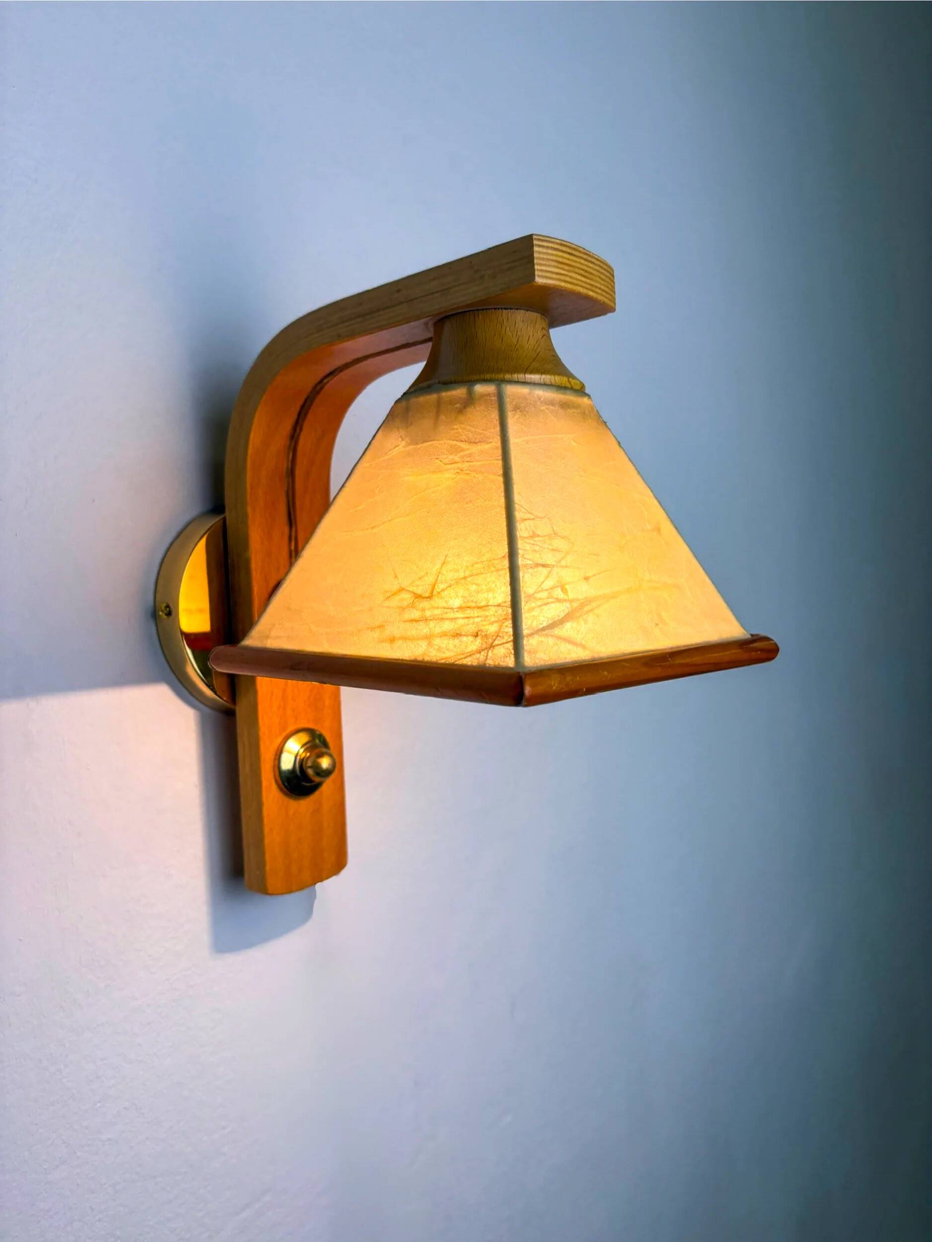 Pair of Italian "Cocoon" wall lights, resin and pine wood, circa 1970s