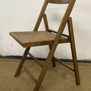 Vintage wooden and cane folding chair