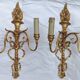 Pair of "torch" wall sconces Louis XVI in gilded bronze