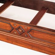 Bed made of solid walnut with marquetry details. France, 1930s.