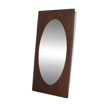 Faceted oval mirror with rectangular oak frame from the 1920s.