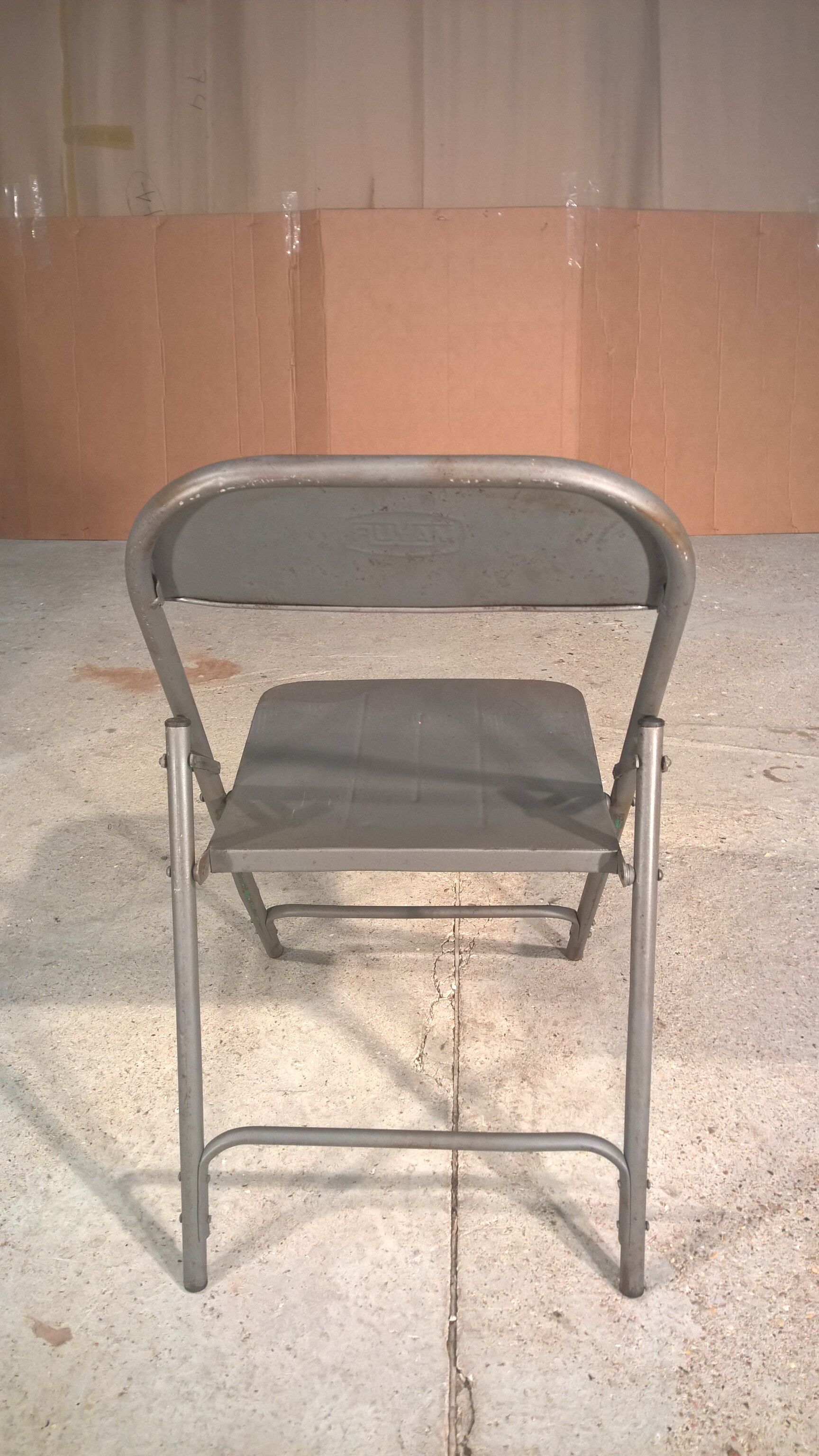 Industrial metal folding chair