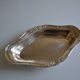 Flat basket cup in silver metal