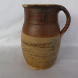 Old stoneware milk jug
