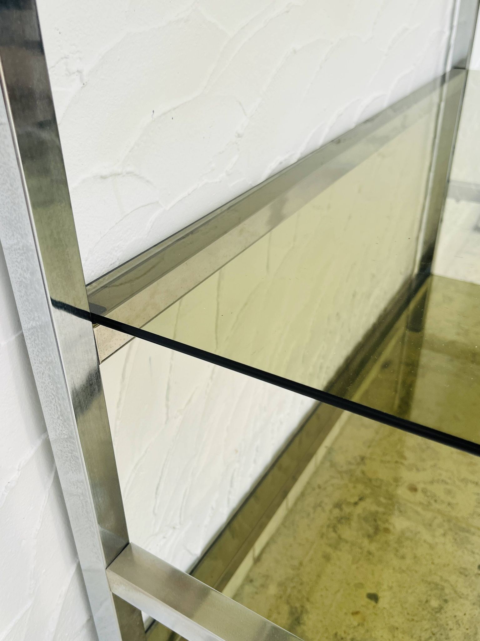 Chrome and smoked glass shelf in Italian 1970s style.