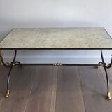 Coffee table in brushed steel and brass