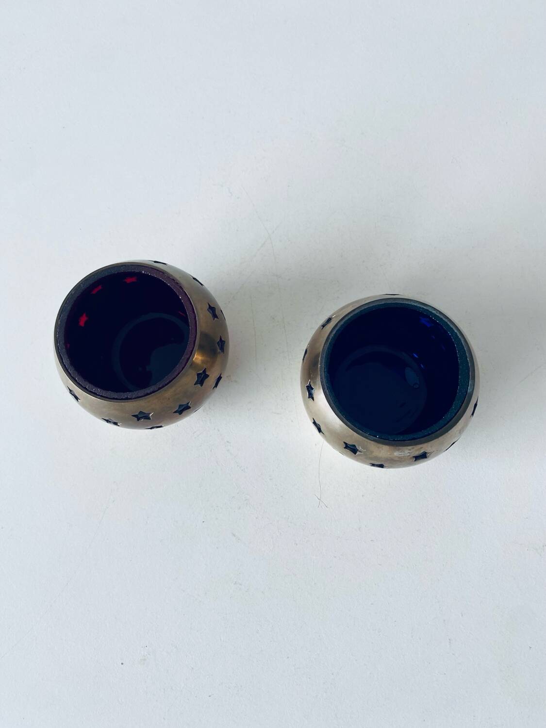 Pair of brass and glass tealight holders