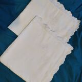 Duo of old pillowcases, AL monogram with buttons