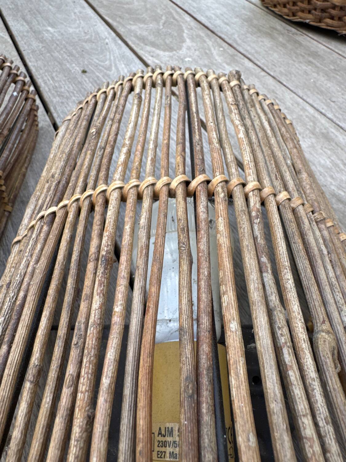 Two rattan wall lights