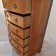 Louis XVI style chest of drawers in wood and cherry veneer.