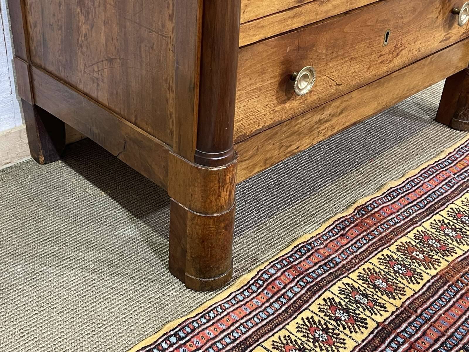 19th-century Empire commode in walnut with a grey St Anne marble top.