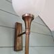Pair of Art Deco wall sconces in brass and white opaline, 1930.