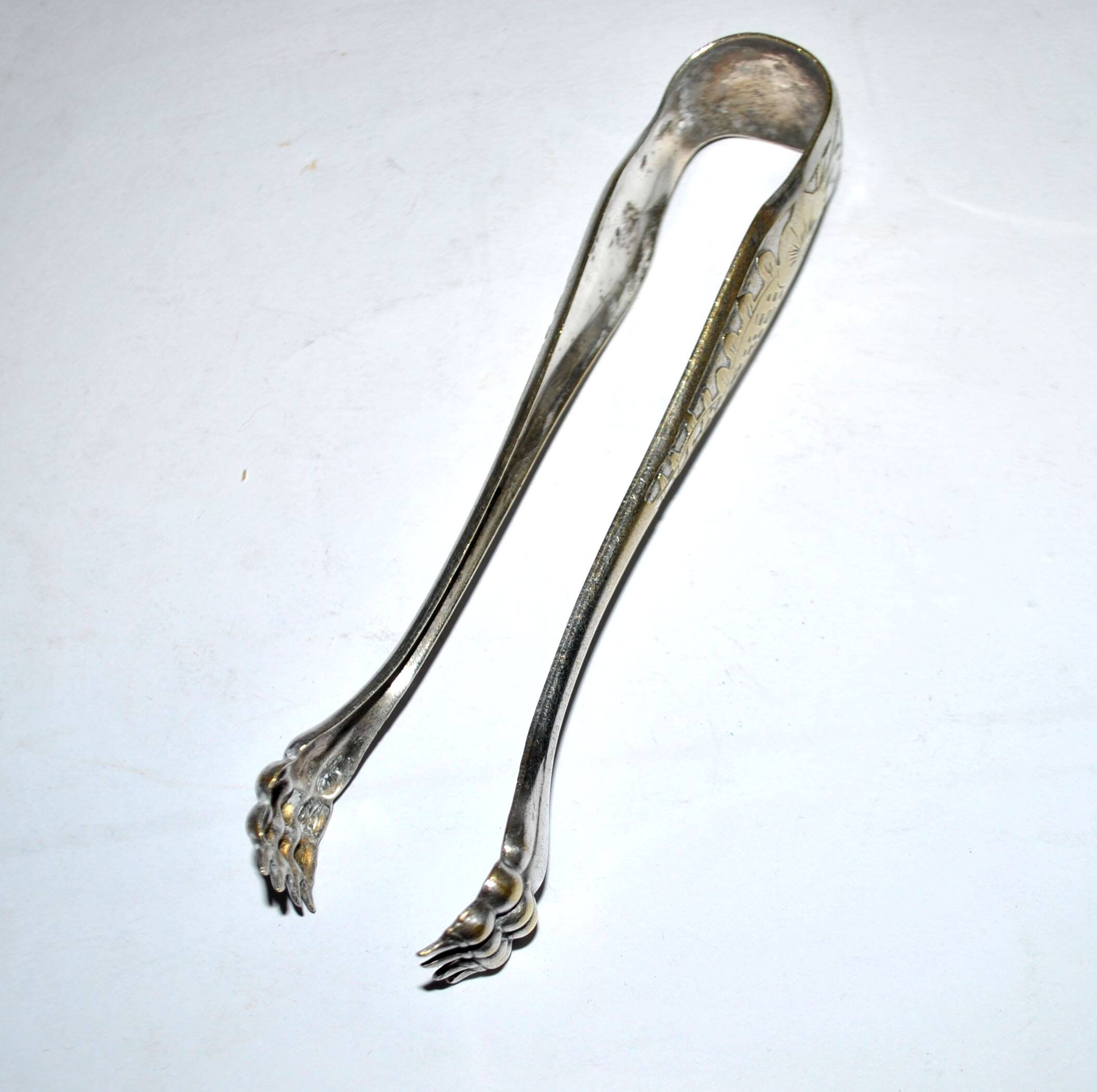 Pince à sucre en métal argenté vintage