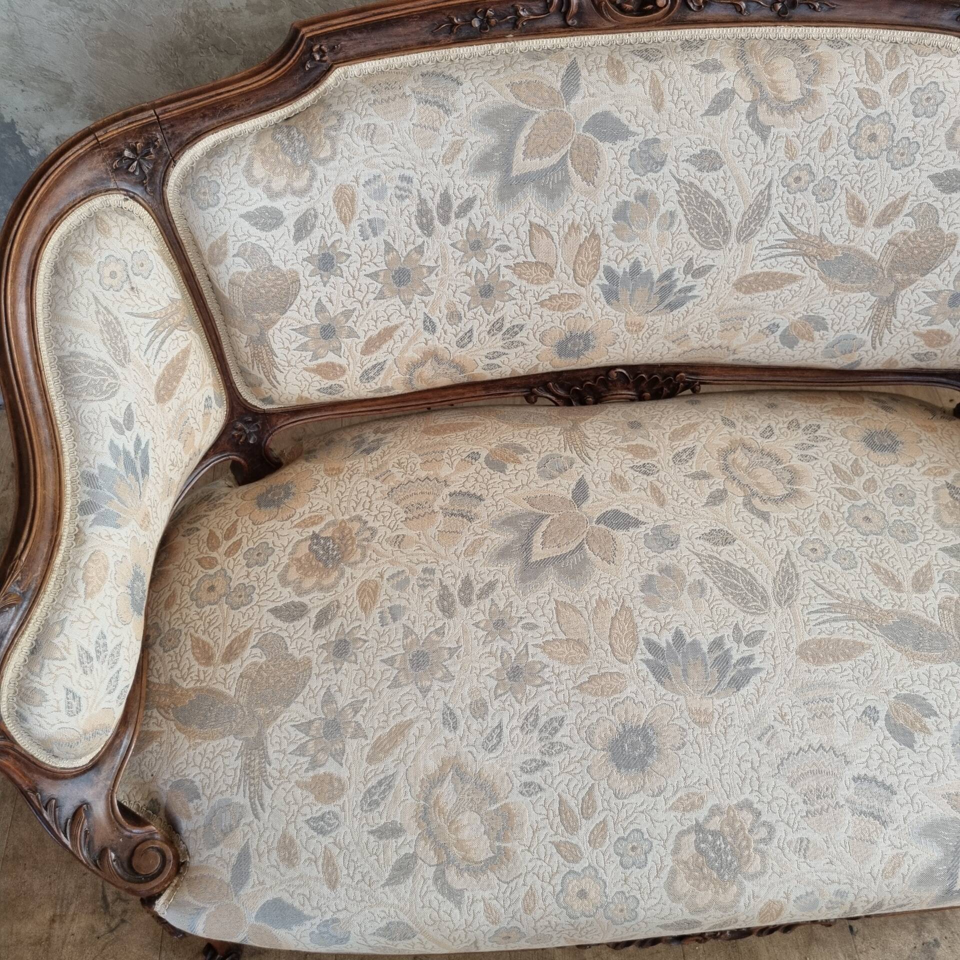 Small sofa or bench in Louis XV style, rococo.