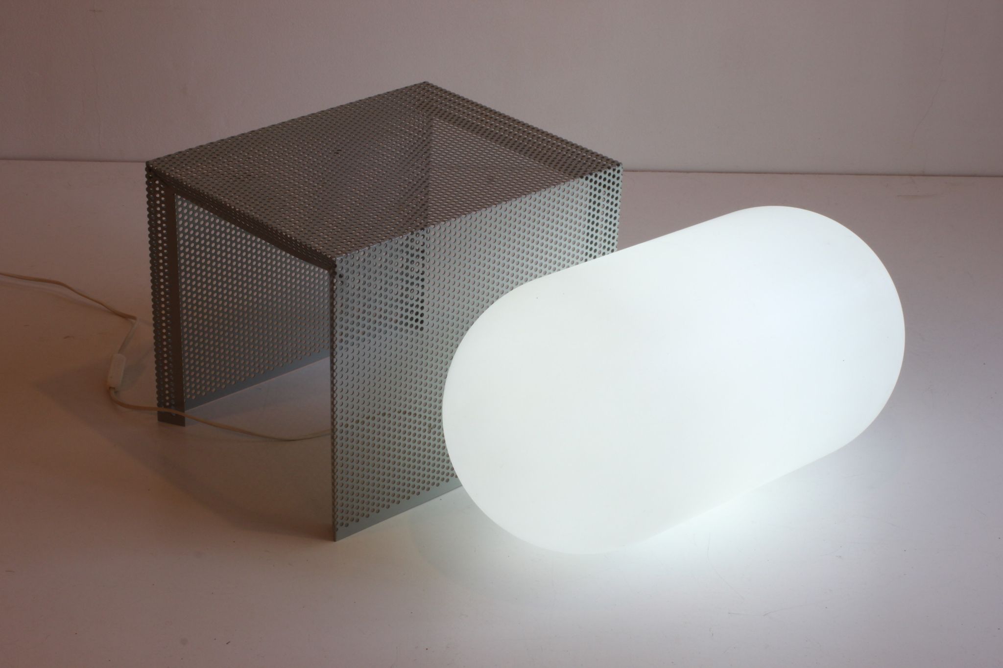 Grey perforated metal nesting side tables, 1990s set of two.