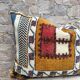 Housse de coussin vintage en kilim berbère : coussin en laine marocaine
