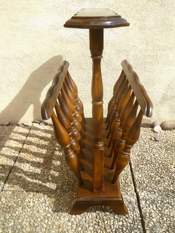 Vintage wooden magazine rack with tablet