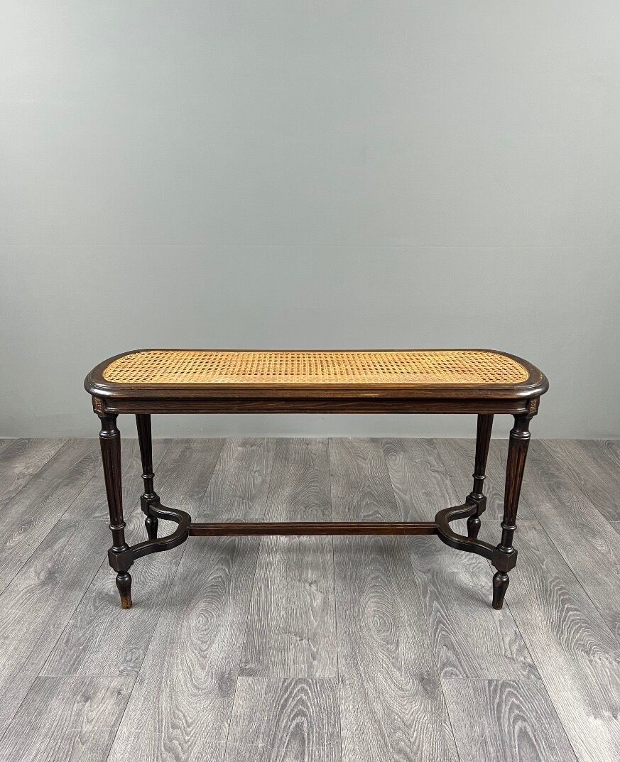 Antique wooden bench, caned seat, Louis XVI style, 20th century.