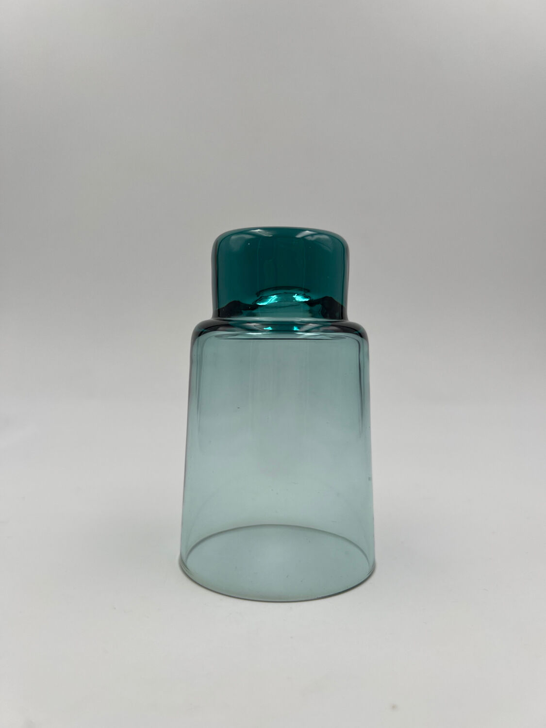 Eight bluish glass water glasses