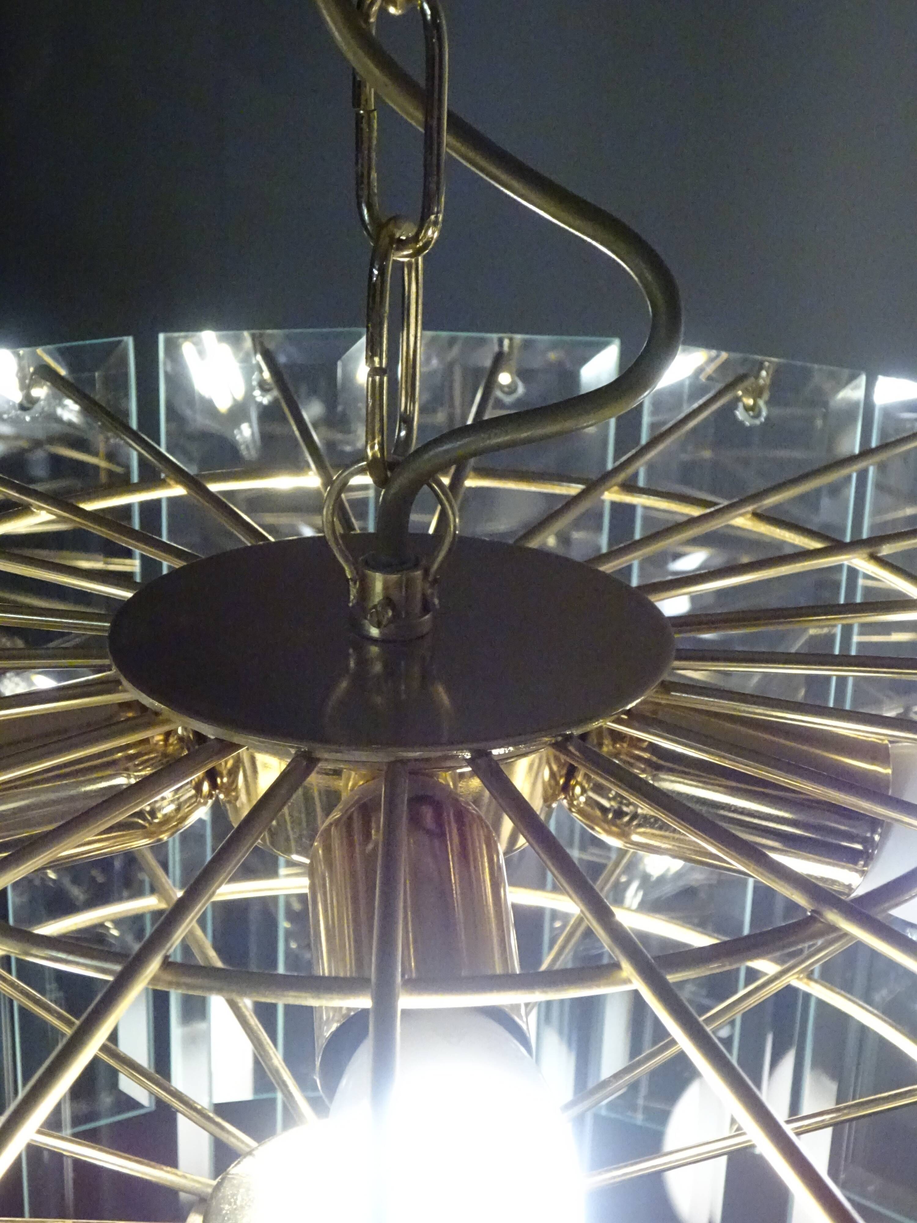 Brass chandelier and beveled glass, Italian manufacturing