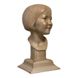 Plaster bust, young girl, monogram and date.