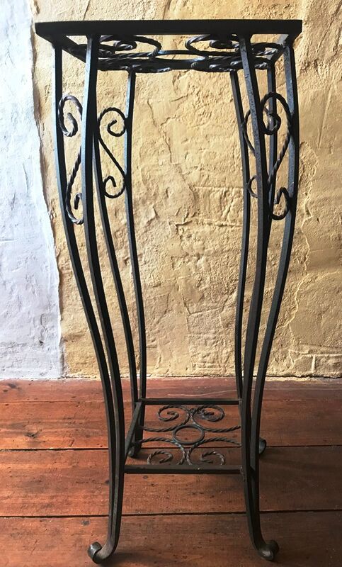Wrought iron plant holder shelf