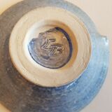 Empty pocket bowl cup on ceramic pedestal with signed spike holes