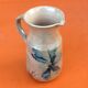1960s Glazed terracotta pitcher with floral decoration
