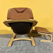Danish vintage cognac leather armchair and footstool by Skipper Mobler