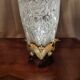 Pressed glass vase on bronze base
