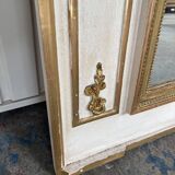 Mirror decorated with weapons