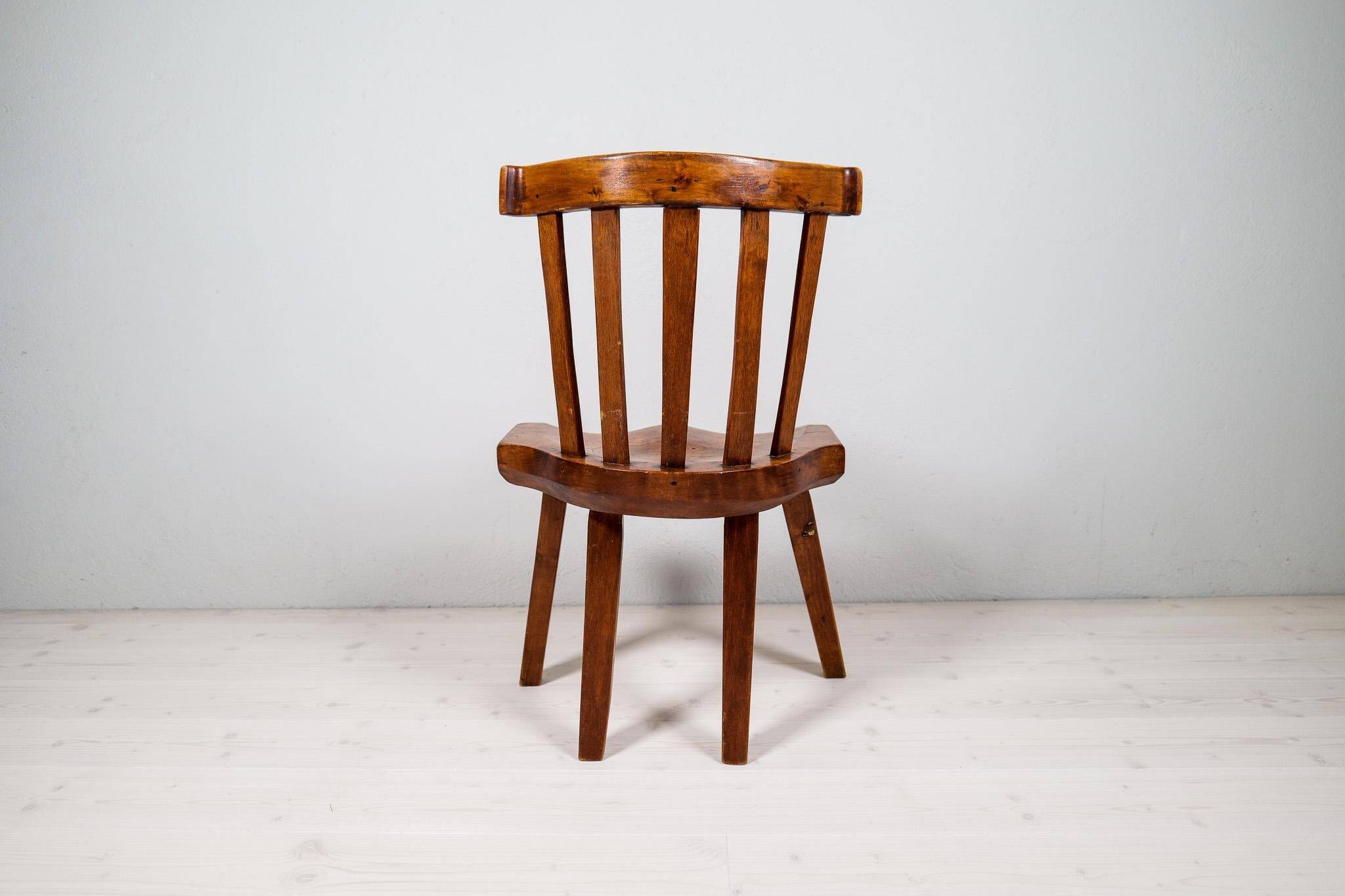 Swedish folk art chair from the 19th century with highly decorative forms.