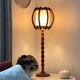 Turned wood lamp.