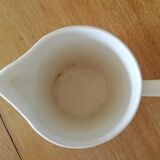 White pitcher in faience