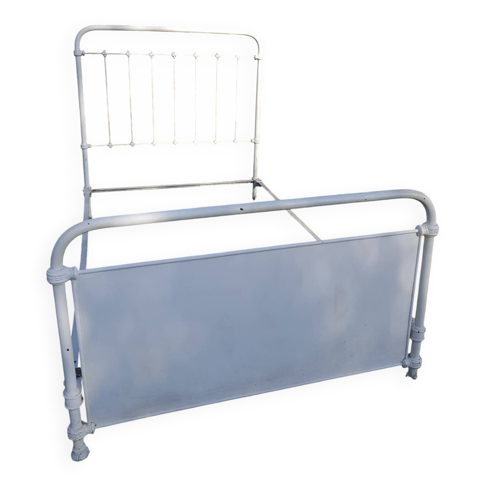Old white metal bed from 1900