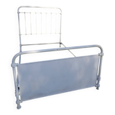 Old white metal bed from 1900
